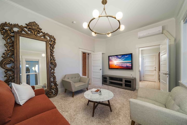 TV room with queen-sized sofa couch (American Leather Brand, very comfortable, no bar). Shared full Jack and Jill bathroom. 