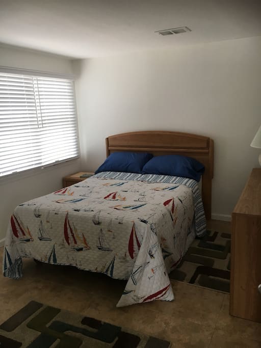 Bedroom 2. Full bed with TV, and 1 closet.