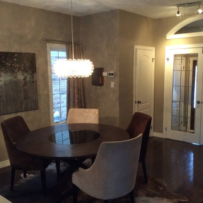 Dining area with adjacent island with more seating