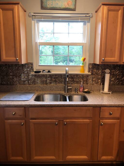 Kitchen-all cooking utensils and paper products provided