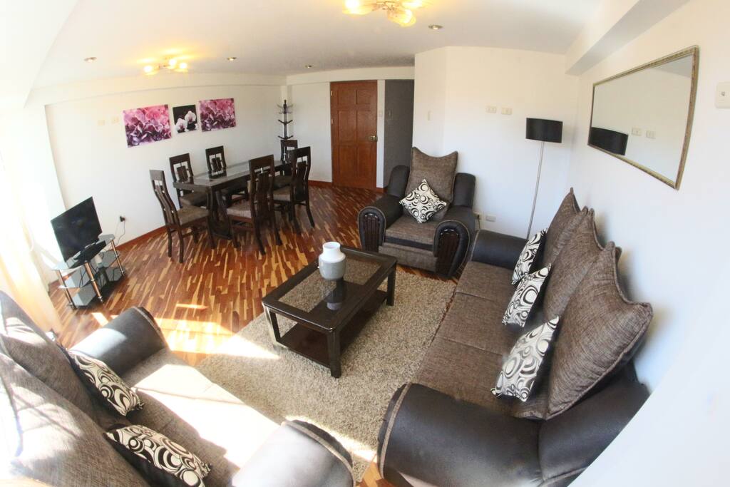Living / dining room with view to the entrance door