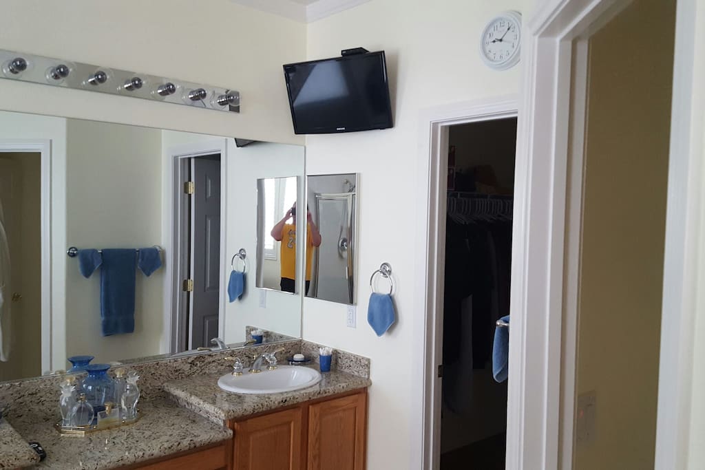 Your own private bathroom attached to your bedroom, with His 'n' Hers bathroom sinks. Wall mounted TV.
