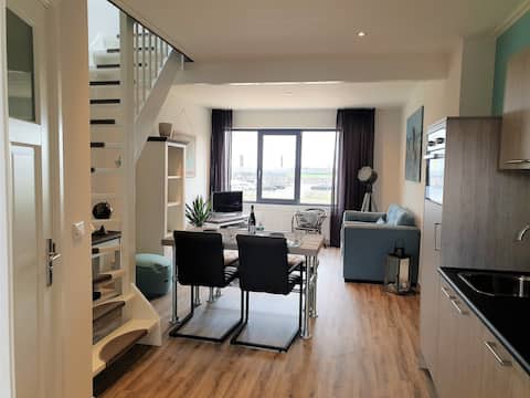 Top performing Airbnb: L'Ancora apartment molenzicht in Sint Annaland