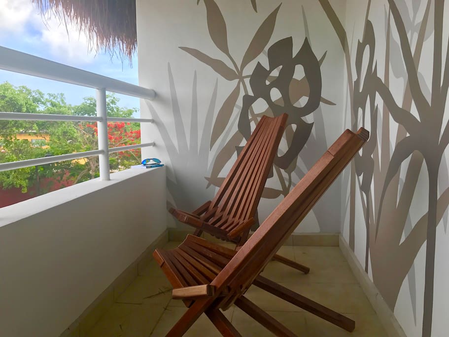 Private balcony decorated with murals by a local artist