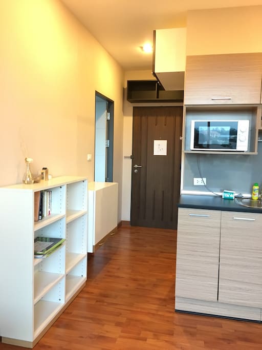 Front door with bedroom on the left and bathroom on the right