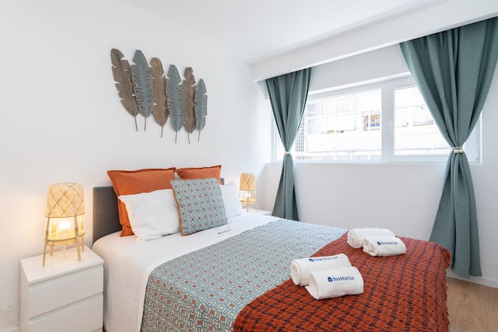 Cozy Bright Flats w/ Netflix | Garage by HostWise