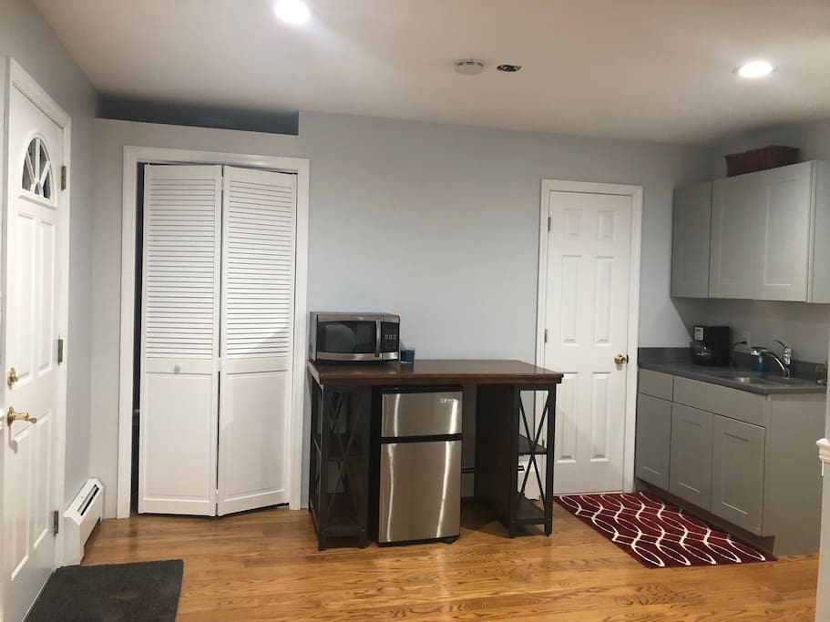 The door on your right is a private entrance for you. It is a private studio. The door on the right is the bathroom. Washer and dryer coming soon.