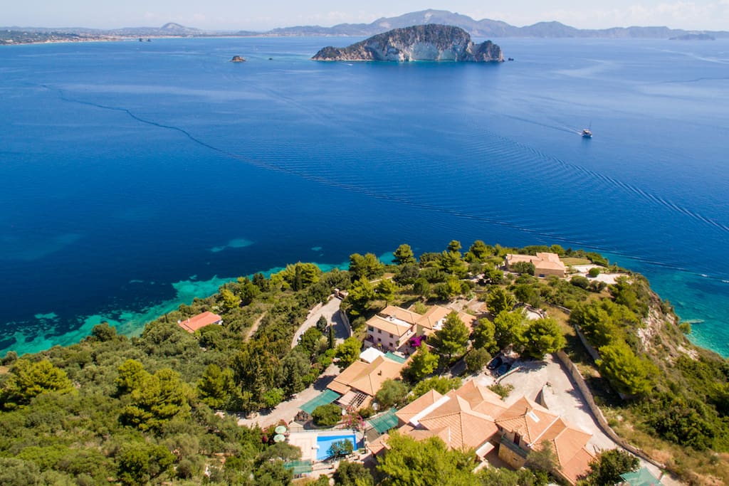 Panoramic view from Villas Cavo Marathia over the bay to Marathonissi Island