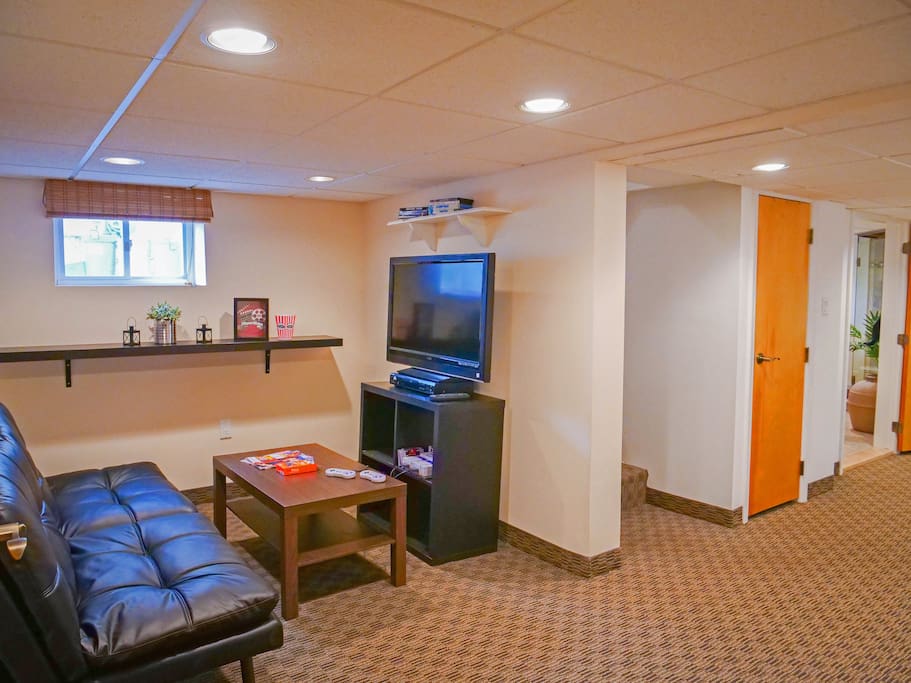 Small living room with flatscreen, Super Nintendo, and Amazon Firestick