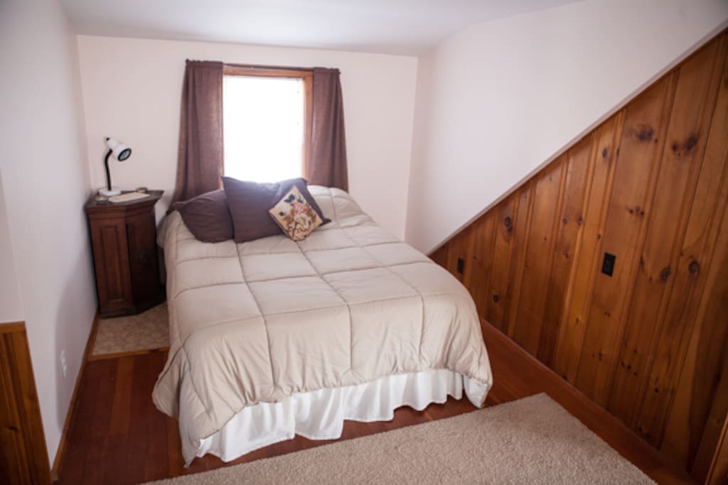 The room offers this comfortable double bed, cool in the summer and warm in the winter.