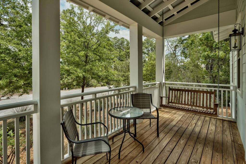 Swing yourself into vacation bliss out on your porch.