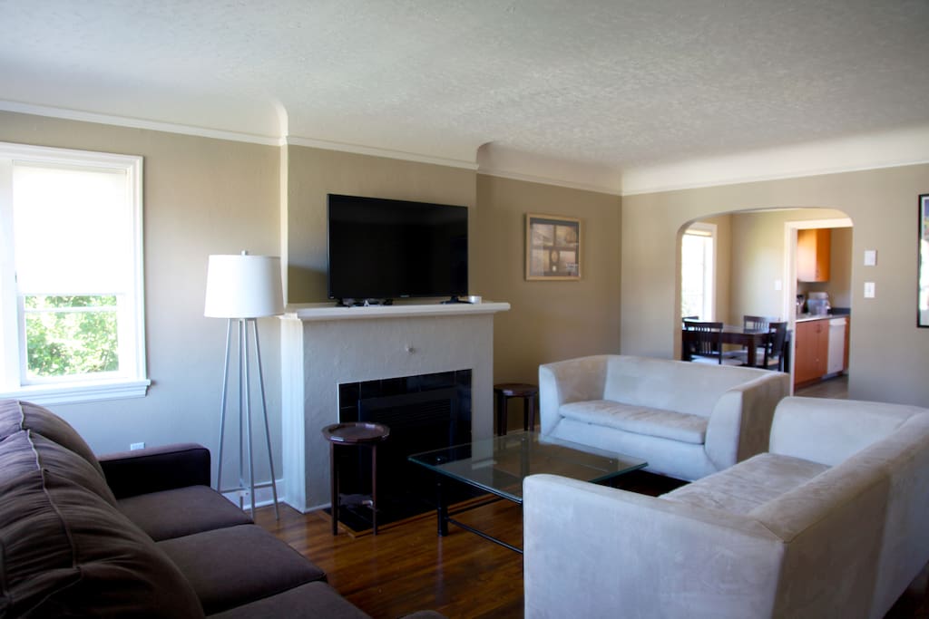 Big living room with extra hide a bed.