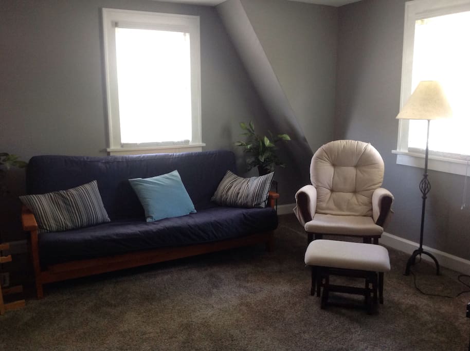 Futon and sitting chair in the living room