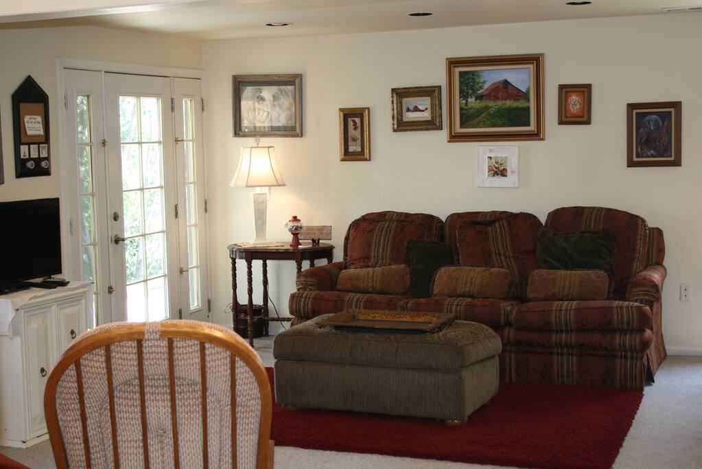 Private entrance opens into bright and roomy living room.
