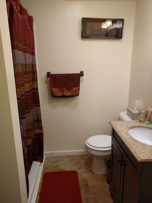 Bathroom right off of bedroom. No tub, shower only.