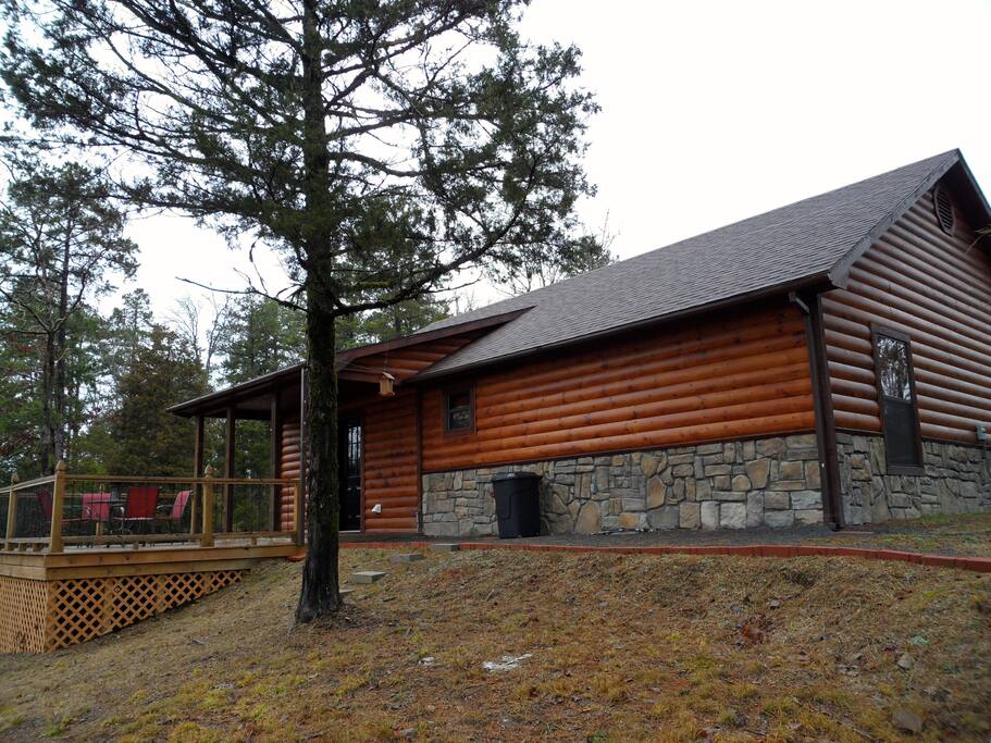 Back view of cabin with large elevated deck