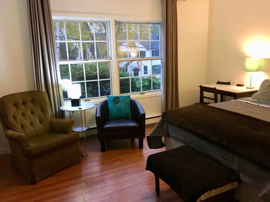 Cozy seating and big windows in Room #1