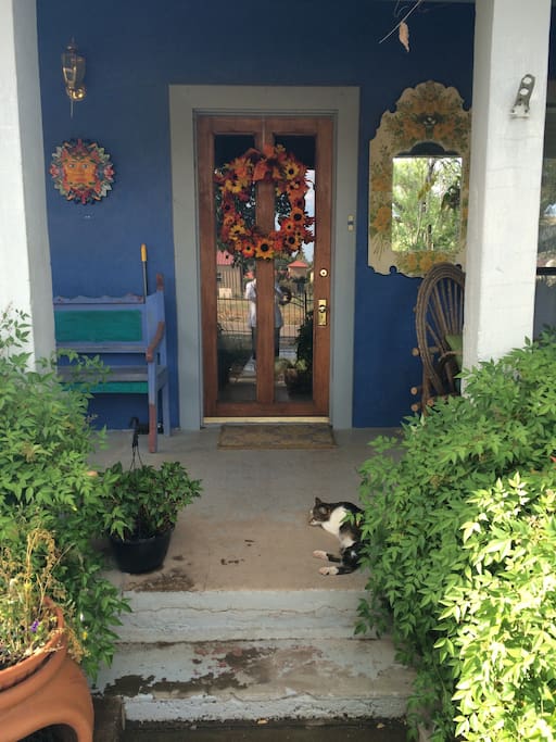 Front door and porch, a great place to enjoy a glass of wine and watch the sunset