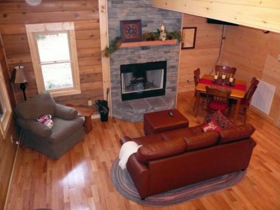 A comfortable living room with fireplace.