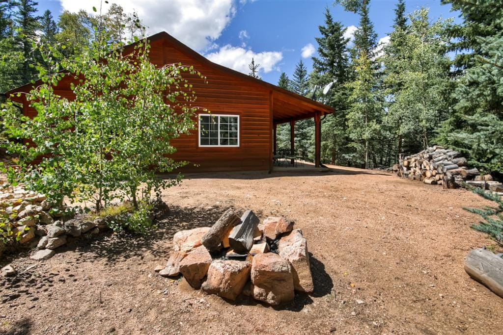 You'll simply fall in love with this cabin's wonderfully serene setting, tucked amidst thick woods