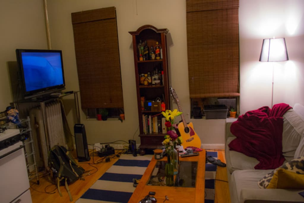 Living Room. Has a couch, TV and chromecast.