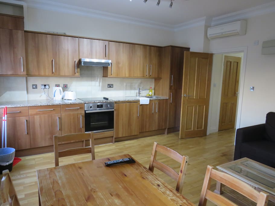 Living room with open plan kitchen