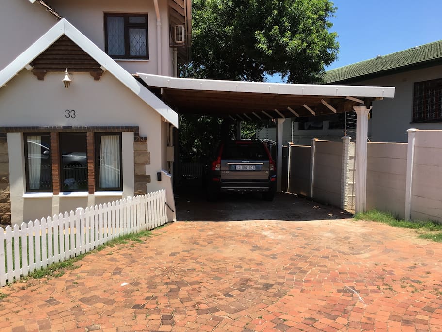 Shaded carport. Plenty of additional off-road parking. One garage space available.