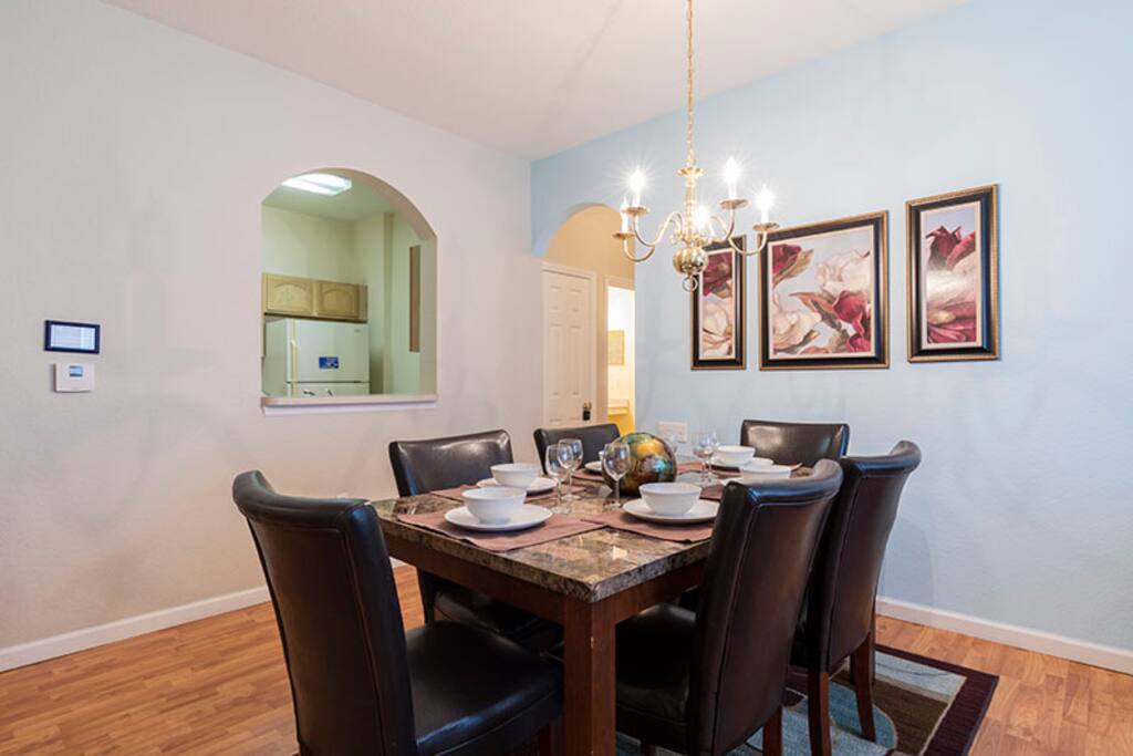 Dining area with stylish seating for 6 people