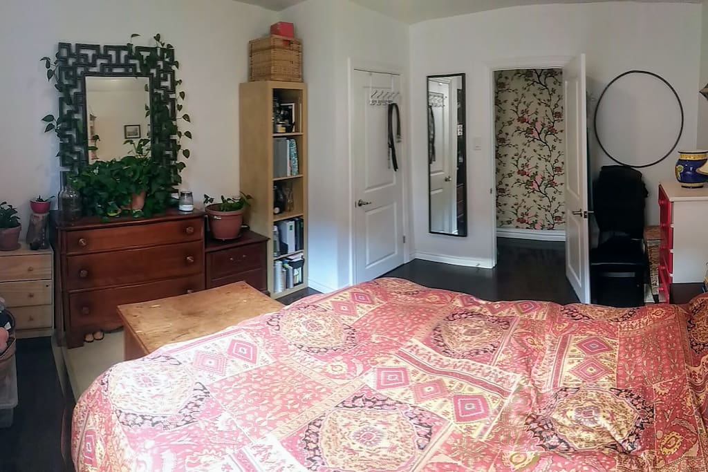 Spacious bedroom with queen bed