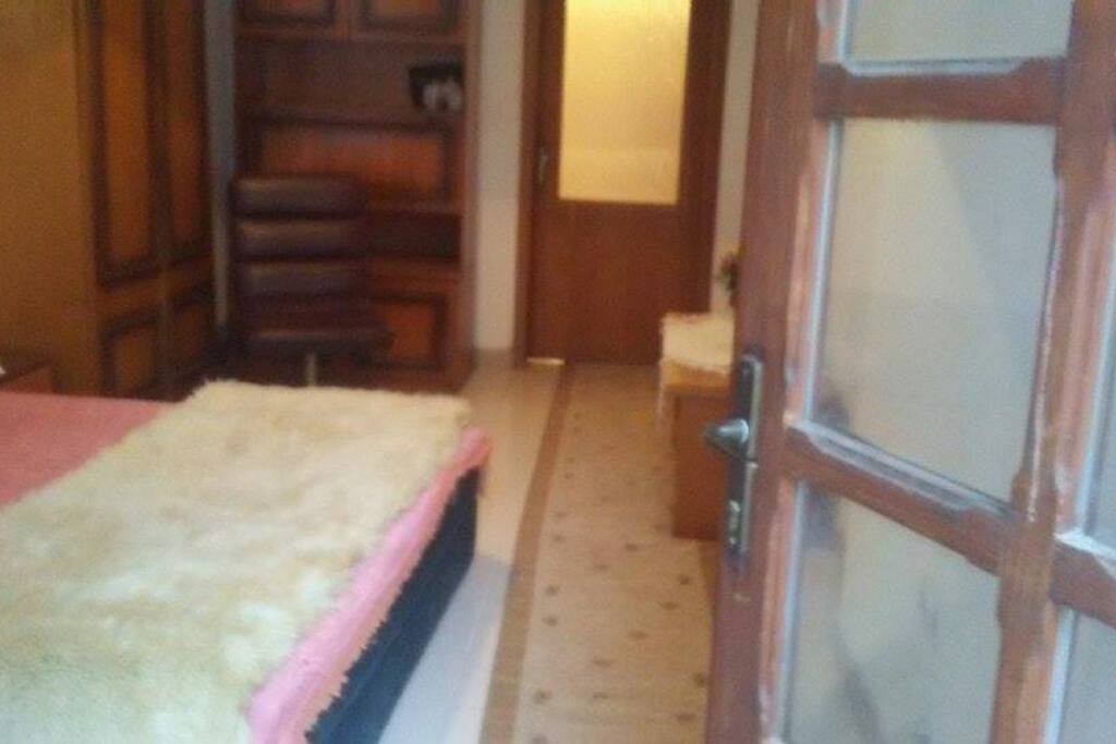 Double bed, seating area, big windows entering great light