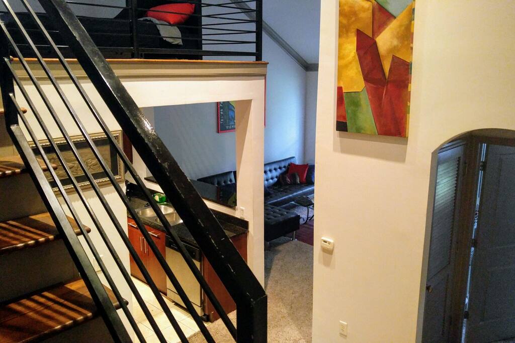 picture from the stairs facing the guest space upstairs