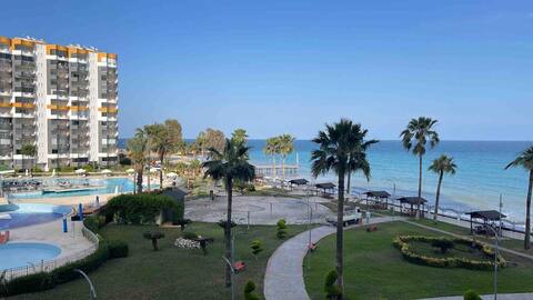 2B condo in a beachfront complex with pools