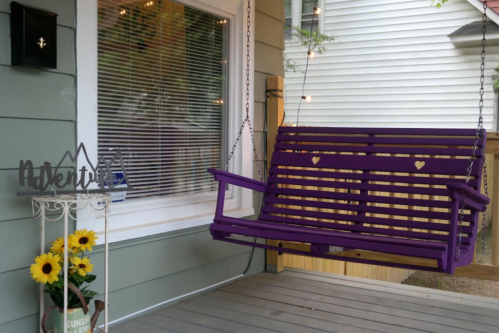 Purple porch swing. Came from my childhood home :)
