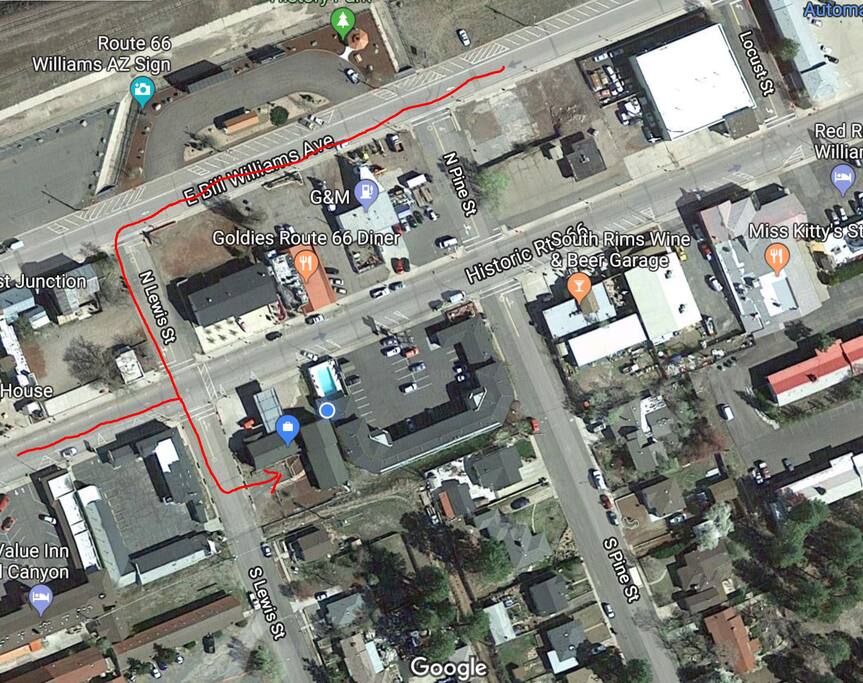 Route 66 is a ONE WAY EAST and E Bill Williams is a ONE WAY WEST. This is how to access the PARKING.