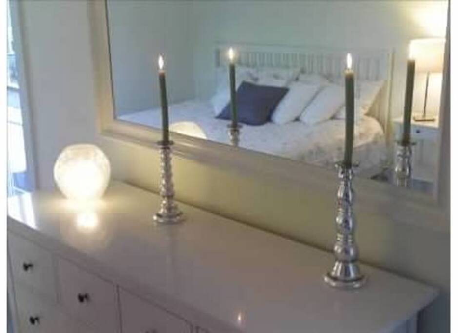A Spacious Master Bedroom with a King Size Bed!