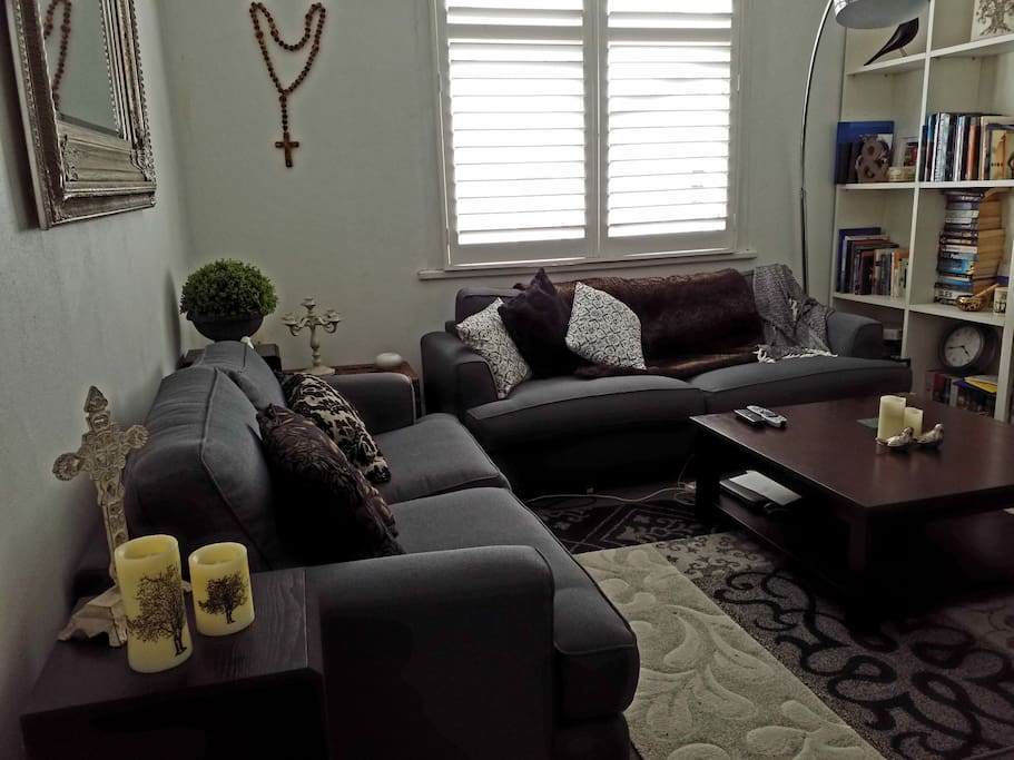 Comfy couches with large t.v. sky, for airbnb guests only.