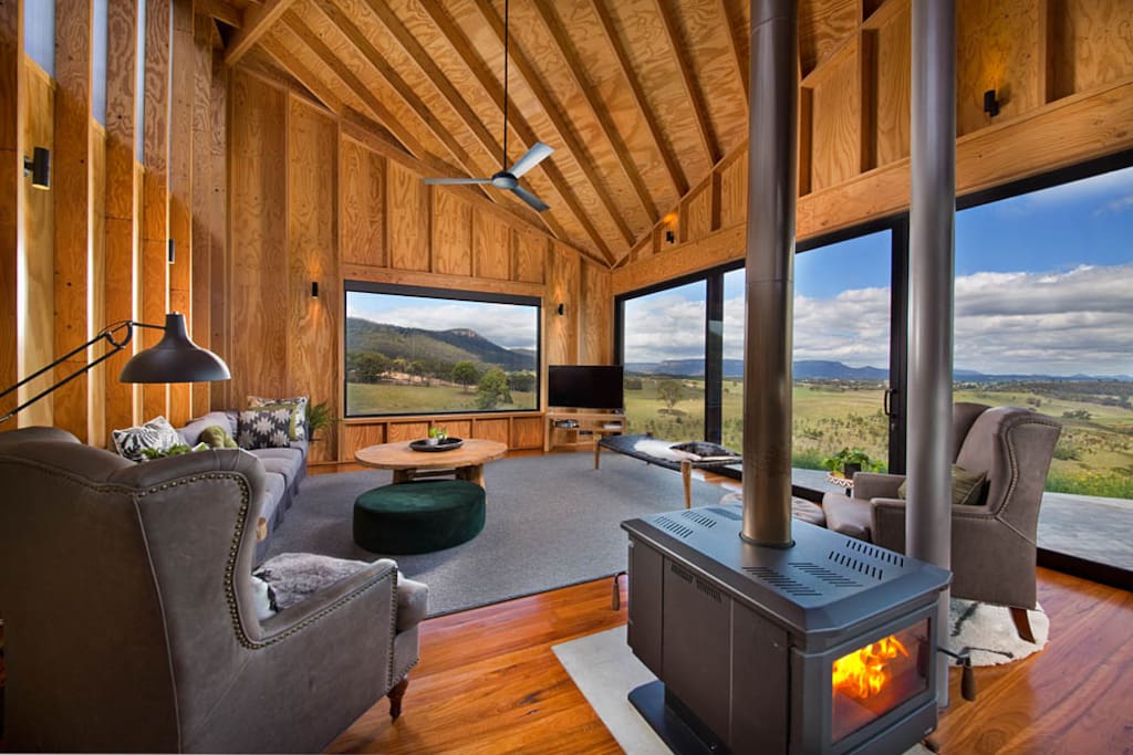Living area with double-sided woodburner