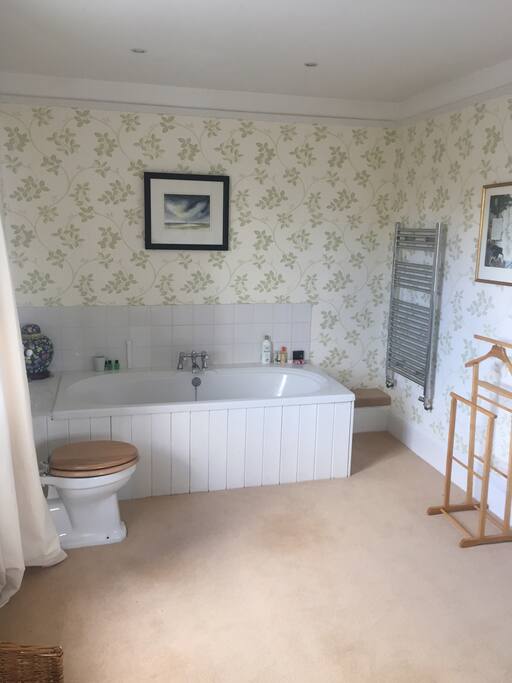 Large ensuite bathroom.