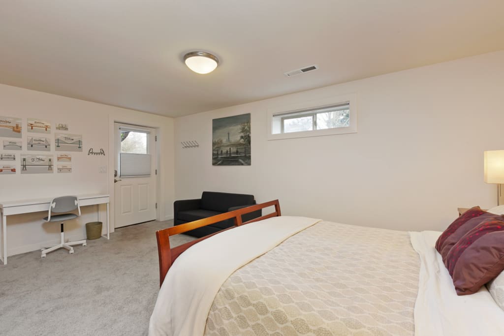 Bright and Spacious Room with Door Directly to the Outside. Desk for Your Laptop or Writing Postcards.