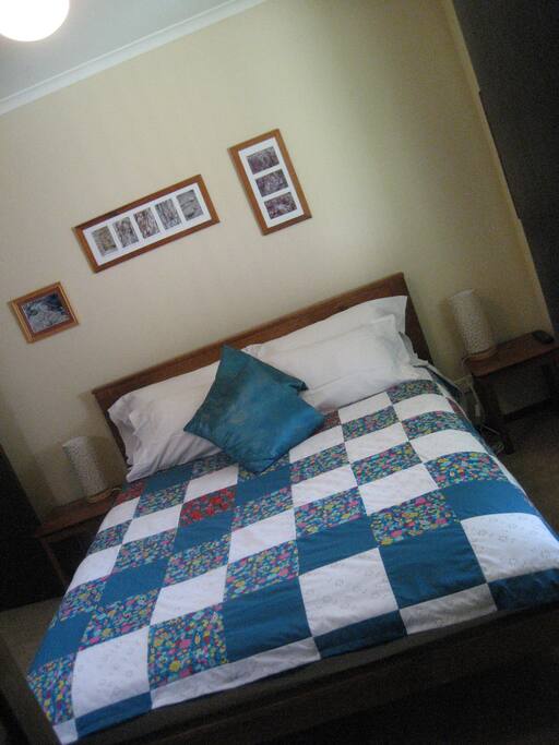 Very comfy bed with view of lovely gardens.
