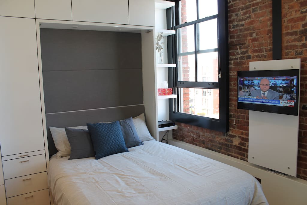 Queen sized murphy bed.