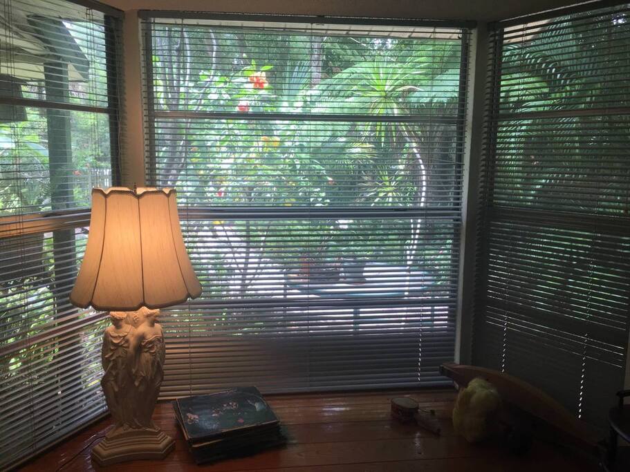 Bay window with window seat has a front view.