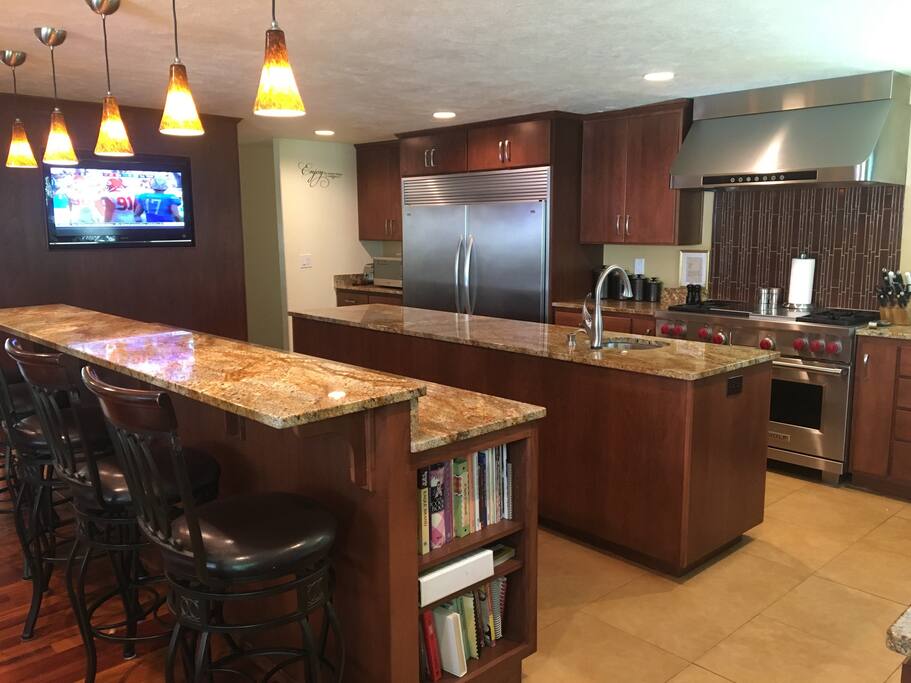 Counter has 5 bar stools