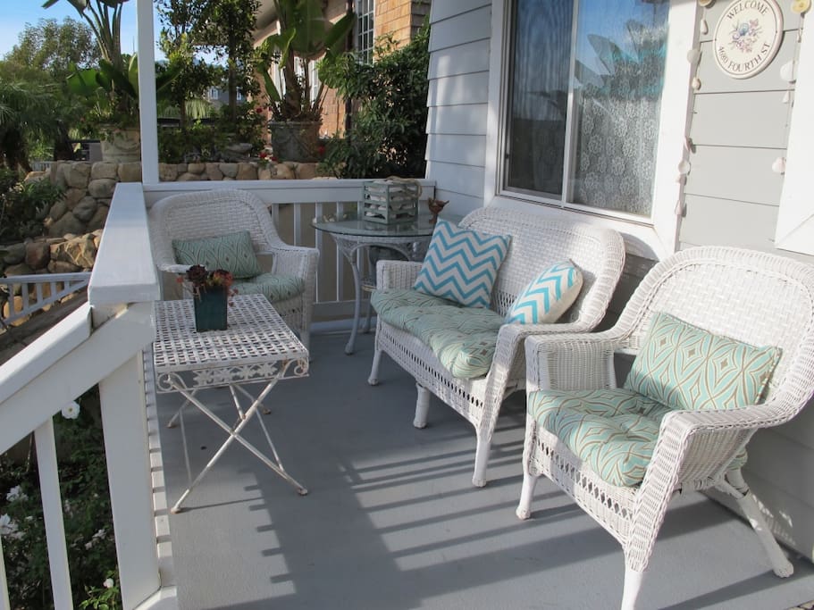 Front porch of the Beach House offers year round outdoor seating.