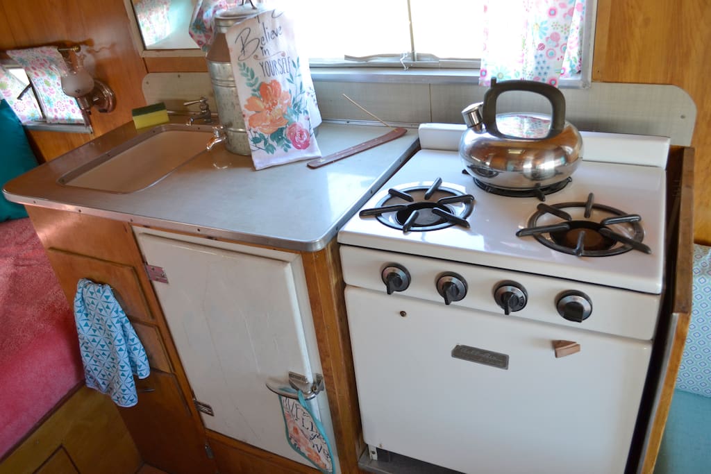 Kitchen has a 3 burner stove and an oven. Also, an original Ice Box from the 50s that will keep your food and drinks cold - Bring Your Own Ice