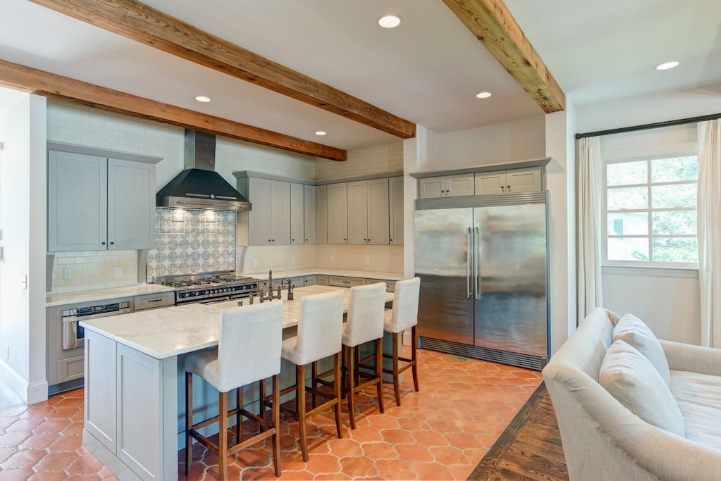 As soon as you walk in, you'll enter a large open kitchen/living/dining area.