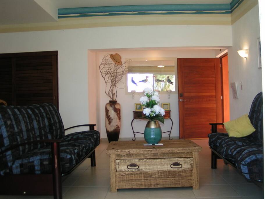 Front Room has two full futons with 12 ft slider out looking Marina