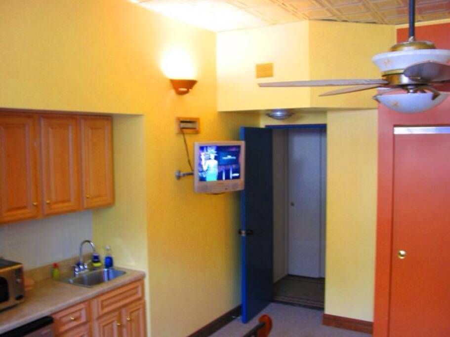Overhead fan. Sliding-door closet includes dresser.