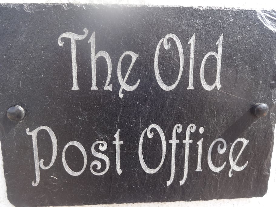 Sign at front of house