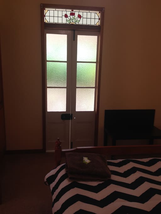 Bedroom 1 Facing doors to front verandah